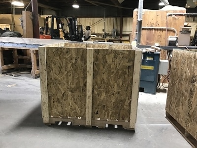 Custom specialty wooden crates pallets and skids manufactured by May Wood Industries Maywood Industries outside Chicago, IL